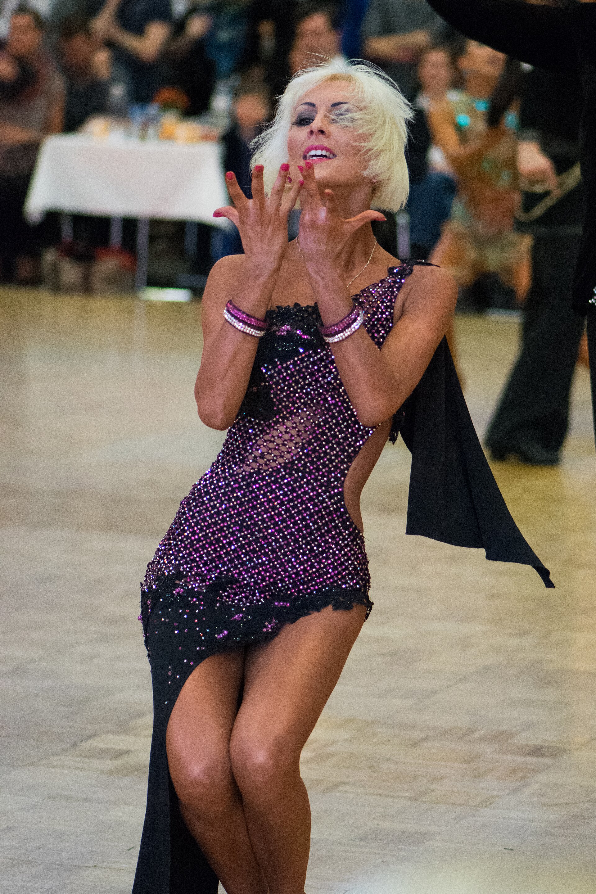A Latin ballroom dancer mid-performance