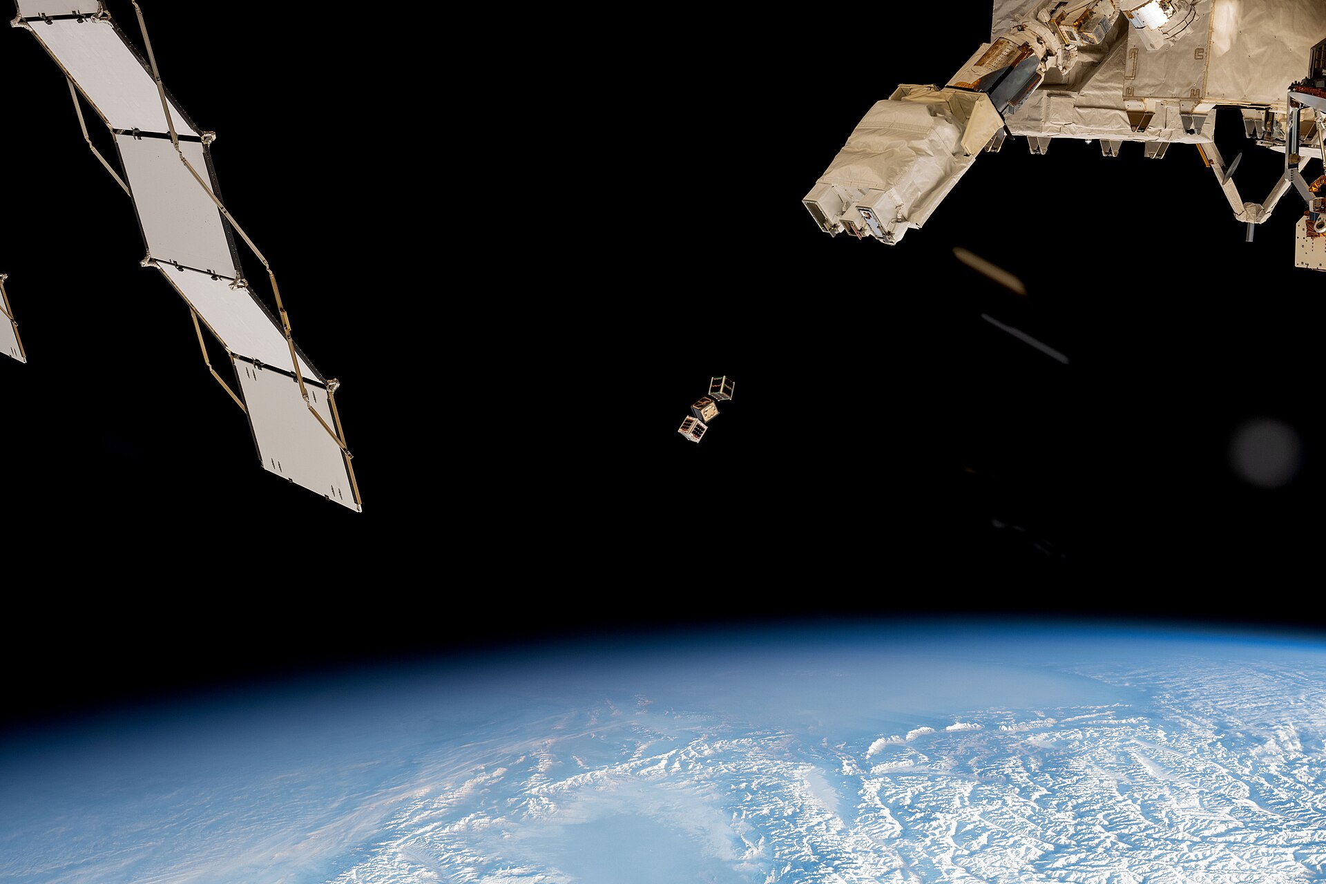 Satellites in orbit above Earth